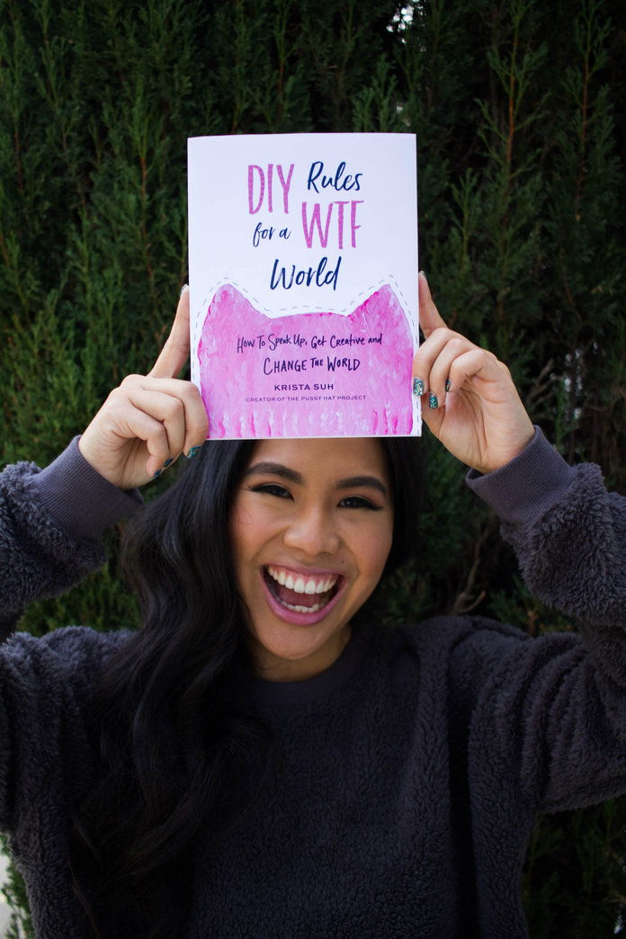 Криста Suh Holds Her New Book: A DIY Rules for a WTF World 