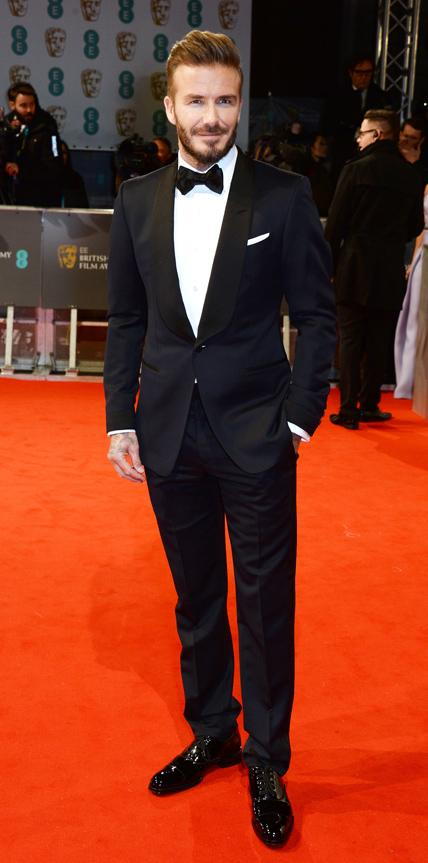 Дейвид Beckham in a tuxedo.