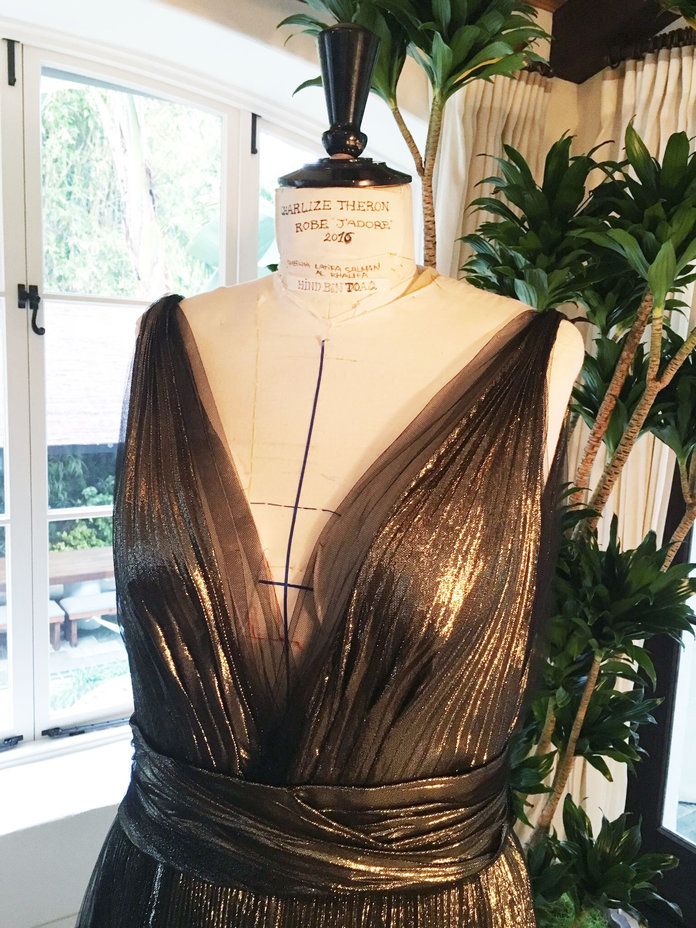 нагоре close with Charlize Theron's custom Dior gown.