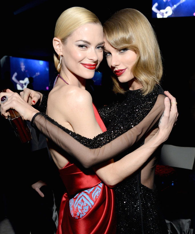 WEST HOLLYWOOD, CA - MARCH 02: Actress Jaime King (L) and recording artist Taylor Swift attend the 22nd Annual Elton John AIDS Foundation Academy Awards Viewing Party at The City of West Hollywood Park on March 2, 2014 in West Hollywood, California.
