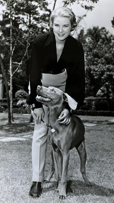 Ιανουάριος 1956, American actress Grace Kelly, pictured with her dog