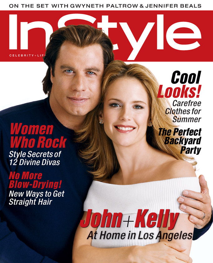 Юли 2001 Cover Stars John Travolta and Kelly Preston