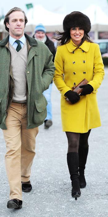 Pippa Best Outfits - Katherine Hooker coat, Cossack fur hat, a Kate Spade clutch, and Aquatalia boots